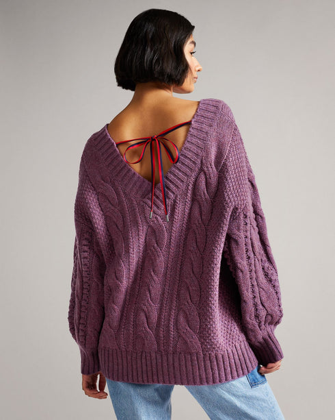 GAIAA-Knitwear-Simple, casual, and comfy … not where GAIAA is concerned. While this bobble knit jumper retains all the classic features that we've come to know and love, ensuring comfort and cosiness at all times, this piece adds a modern-day twist. Part of the MIB collection, the wide neck and low back, complete with bow detailing, adds a little twist to elevate those casual daytime looks. Ted Baker MIB collection Wide v neck Deep back Back ribbon detail Oversized sleeves Ribbed cuffs Our model is 5'9"/